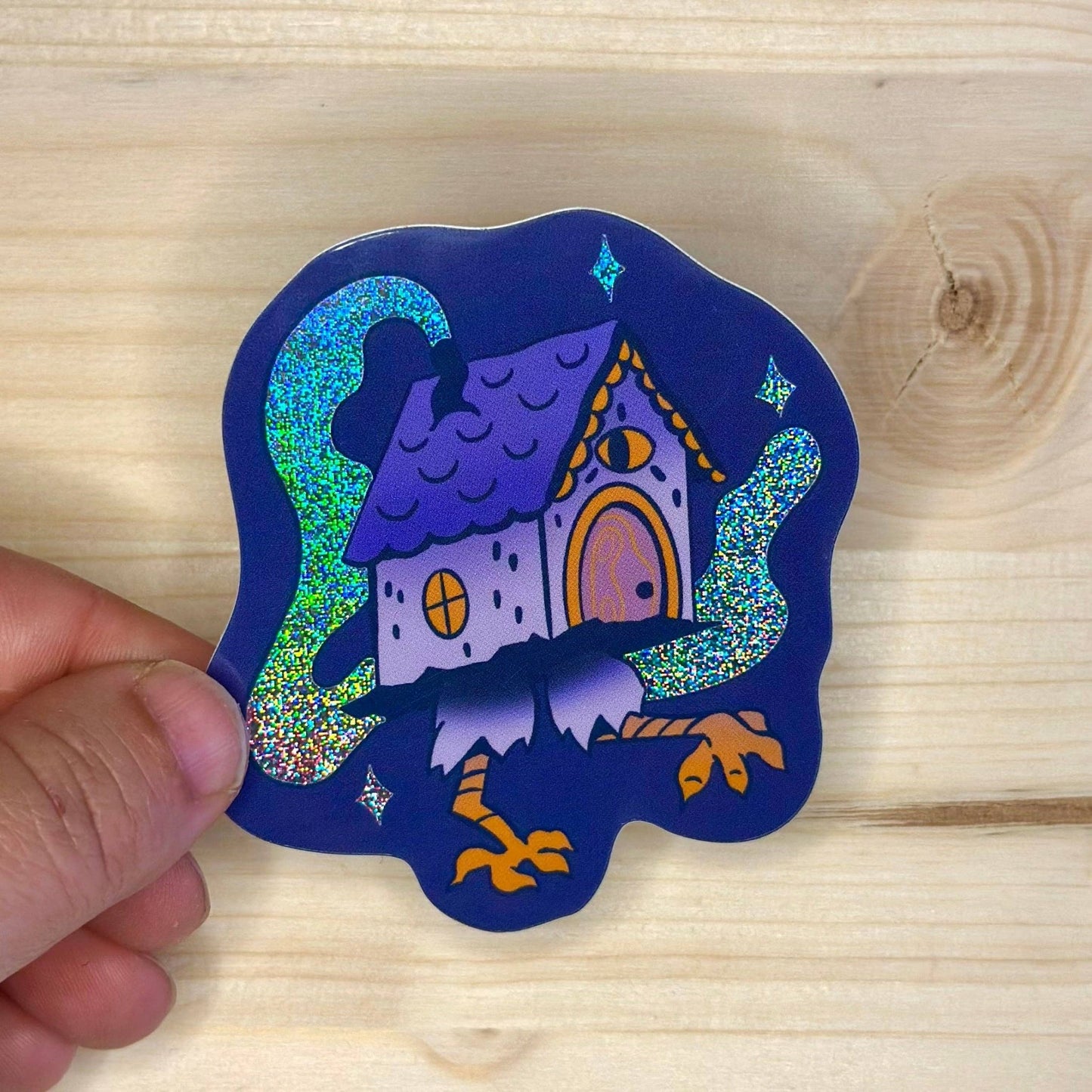 Baba Yaga Hut Holographic Sticker - Odd Hare Goods - The Society for Unusual Books